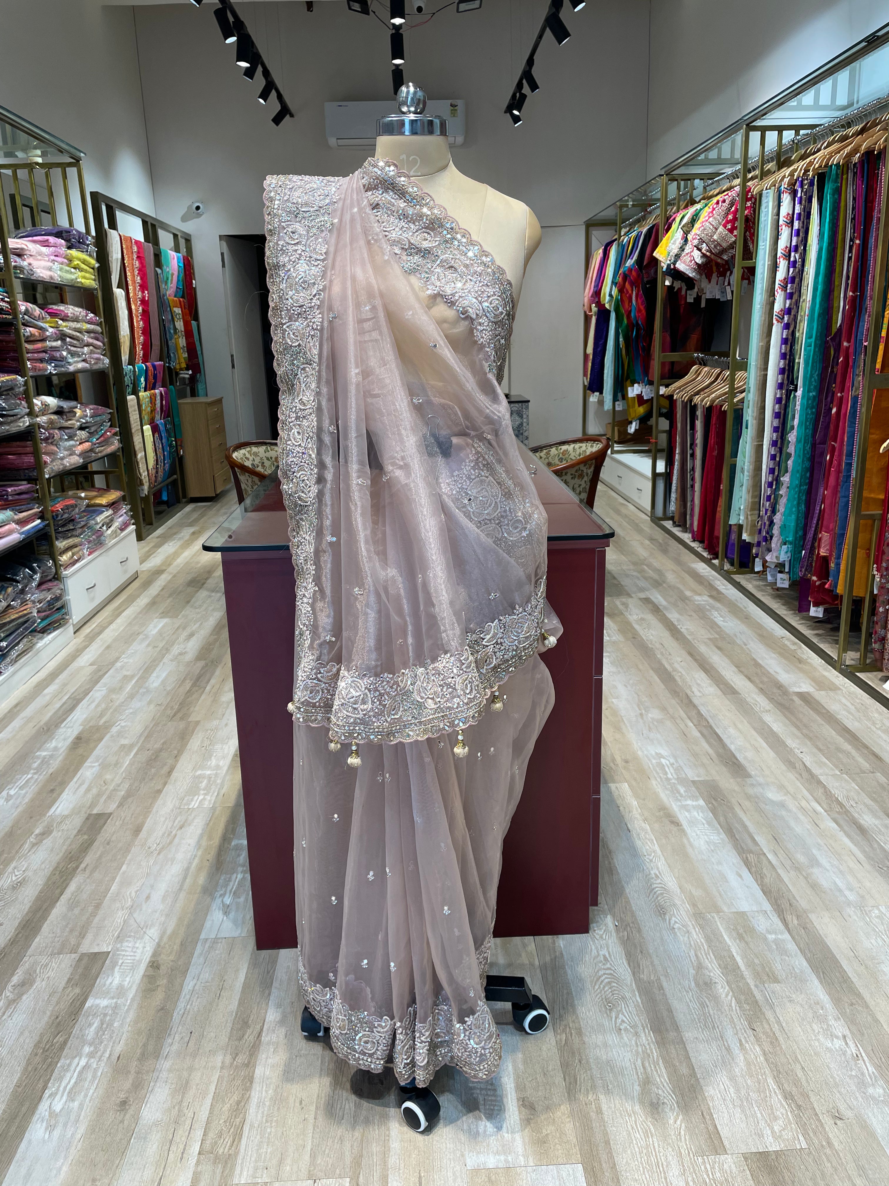 Pure tissue saree with handwork (O)