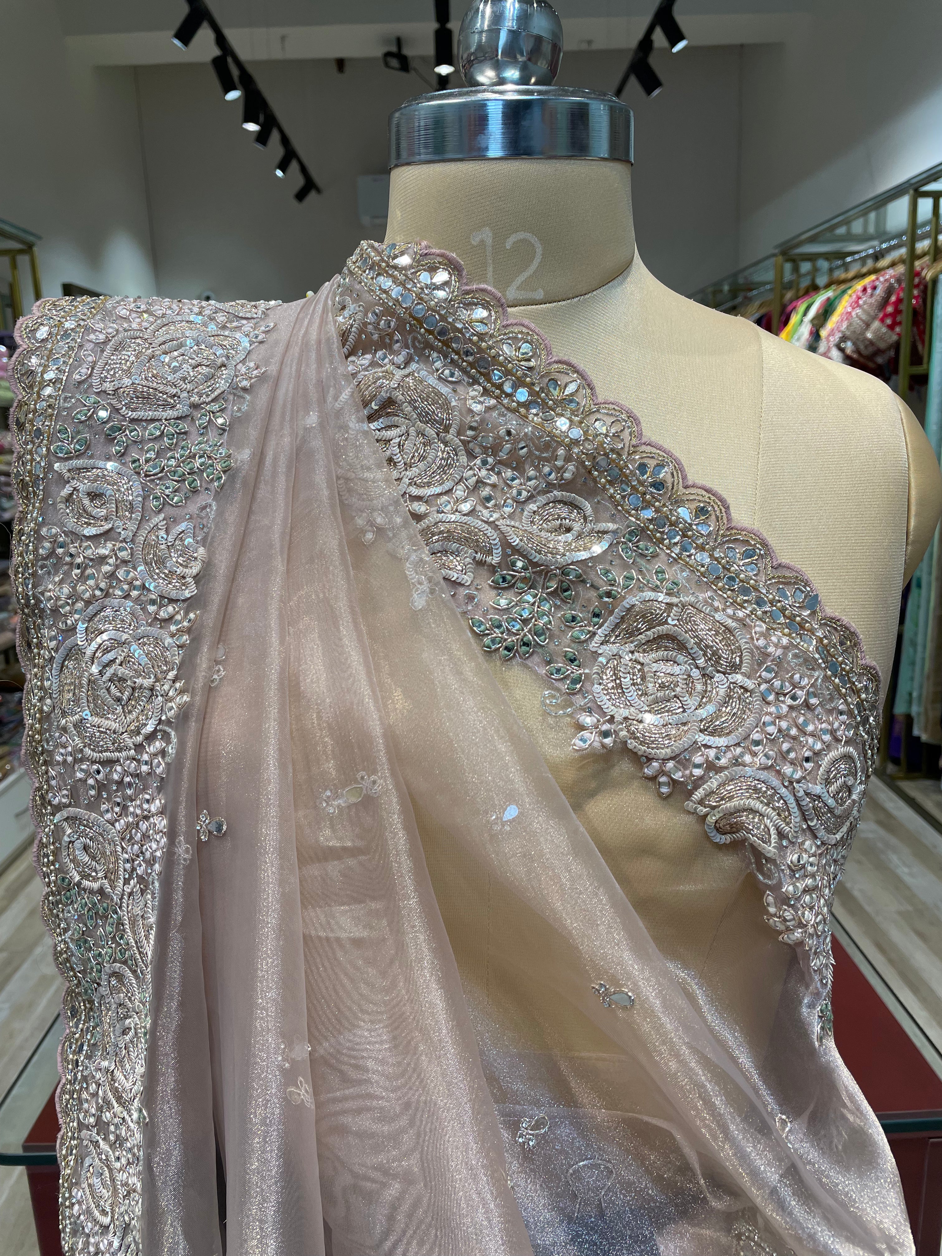 Pure tissue saree with handwork (O)